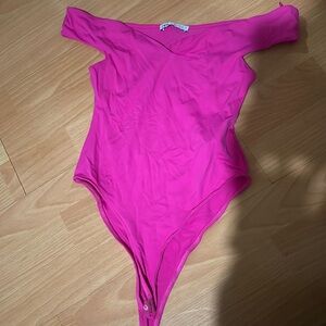 Pink off the shoulder body suit